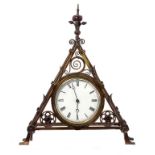 A VICTORIAN GOTHIC BRASS CLOCKCASE DESIGNED BY BRUCE TALBERT, THE MANUFACTURE ATTRIBUTED TO COX &