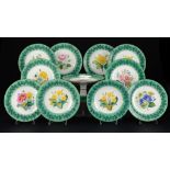 A STAFFORDSHIRE GREEN GROUND BOTANICAL DESSERT SERVICE, C1850 printed and painted with roses,