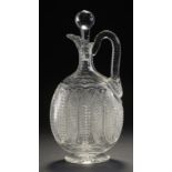 A BRILLIANT CUT GLASS CLARET JUG, STOURBRIDGE, C1900 of flattened form with unusually complex band