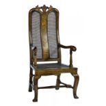 A GREEN JAPANNED ARMCHAIR IN GEORGE II STYLE, EARLY 20TH C with caned back and seat, 121cm h ++