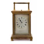 A FRENCH BRASS CARRIAGE CLOCK, C1900 the silvered mask dial inscribed HAMILTON & INCHES PARIS, the