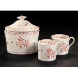 A NEW HALL OVAL SUGAR BOX AND COVER AND A PAIR OF COFFEE CANS, C1790 pattern 295, painted in iron