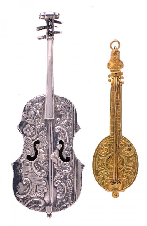 A GERMAN SILVER MINIATURE OR TOY VIOLIN the back hinged to form a box, 9cm l, import marked by James