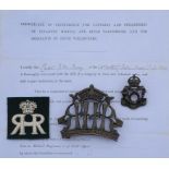 A COLLECTION OF BRITISH MILITARIA including metal and other cap badges, shoulder titles, buttons,