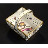 A DERBY MINIATURE RETICULATED BASKET, C1820 painted with birds in branches, butterflies to the