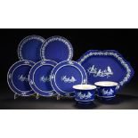 A PAIR OF WEDGWOOD TEACUPS AND SAUCERS, THREE PLATES AND A DISH COMMISSIONED BY CAPERNS OF