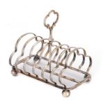 A VICTORIAN SILVER SEVEN-HOOP TOAST RACK 14.5cm h, by William Hutton & Sons, London 1891, 9ozs ++