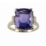 A COLOUR CHANGE SAPPHIRE RING a baguette diamond to each shoulder, in platinum marked PLAT, 8.5g,