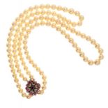 A CULTURED PEARL TWO ROW NECKLACE of 110 cultured pearls ranging from approximately 0.6-0.9cm,