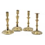 FOUR ENGLISH BRASS CANDLESTICKS, MID 18TH C 19.5-21cm h ++All genuine and excellent examples with
