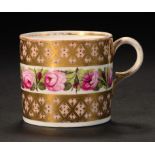A DERBY COFFEE CAN, C1800 painted with a band of roses between bloom and gilt trellis borders, 5.5cm