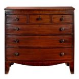 A VICTORIAN MAHOGANY AND LINE INLAID CHEST OF DRAWERS bow fronted and fitted with six drawers with