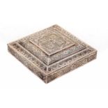 A PERSIAN SILVER SQUARE BOX, EARLY-MID 20TH C intricately engraved with formal foliate decoration,