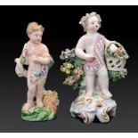 TWO DERBY FIGURES OF A STANDING CHILD WITH A CORNUCOPIA EMBLEMATIC OF EARTH OR AUTUMN AND CUPID WITH