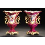 A PAIR OF STAFFORDSHIRE PORCELAIN CLARET GROUND VASES, C1840 painted with a landscape and to the