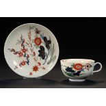A WORCESTER IMARI TEACUP AND SAUCER, C1768-70 saucer 13cm diam, fretted square ++Both in fine