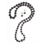 A BLACK CULTURED PEARL NECKLACE of 61 cultured pearls ranging from 0.67-1cm with black cultured