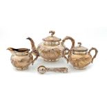 A FINE CHINESE EXPORT SILVER TEA SERVICE, C1890 crisply chased with bamboo on a textured ground,