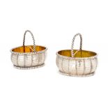 TWO GEORGE III SILVER BASKET SALT CELLARS crested, 9cm h, maker IC, a pellet between, London