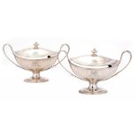 A PAIR OF GEORGE III SILVER SAUCE TUREENS AND COVERS crested, 14cm h, by Henry Chawner, London 1786,