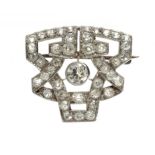 A DIAMOND GEOMETRIC BROOCH, C1940 with larger central diamond collet, 2.6cm w, 6.7g ++In good