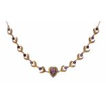 AN AMETHYST AND SPLIT PEARL NECKLET, C1910 with central heart cluster, in gold, 41.5cm l, 7.7g ++