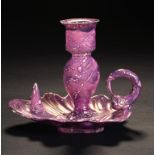 AN PURPLE MARBLED LUSTRE DOLPHIN HANDLED CHAMBER CANDLESTICK, C1820 13cm h ++Stem restored to