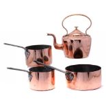 THREE GRADUATED VICTORIAN COPPER SAUCEPANS WITH IRON HANDLE AND A VICTORIAN COPPER KETTLE, MID