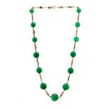 AN ARTS & CRAFTS GOLD AND GREEN GLASS BEAD NECKLACE, C1910 48.5cm l ++In fine condition