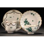 A DERBY FLUTED TEA BOWL AND SAUCER AND COFFEE CUP AND SAUCER, C1780 painted in green monochrome