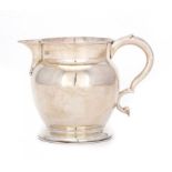 A GEORGE V SILVER DUTCH JUG 13cm h, by James Ramsay, London 1912, 14ozs ++Good condition, no