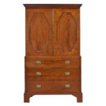 A VICTORIAN MAHOGANY LINEN PRESS, C1840 enclosed by a pair of octagonal panelled doors, the lower