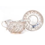 A VICTORIAN SILVER PORRINGER AND STAND, porringer 12.5cm over handles, by Holland, Aldwinckle &