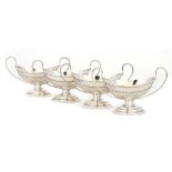 A SET OF FOUR GEORGE III SILVER SALT CELLARS with fluted oval bowl, 8cm h, maker GC, probably George