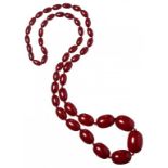 A NECKLACE OF 47 FATURAN BEADS 100g