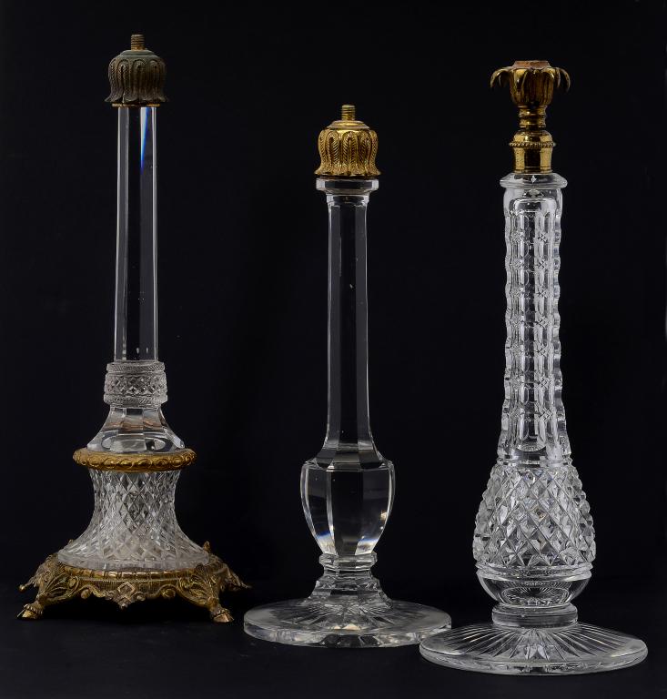 THREE BRASS MOUNTED GLASS CLARKE'S CRICKLITE LAMP BASES, C1880 30 - 33cm h, Cricklite trade mark ++