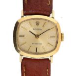 A ROLEX 18CT GOLD CUSHION SHAPED LADY'S WRISTWATCH PRECISION, C1975 1.9 x 2.2cm, on a tan leather