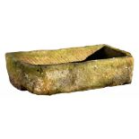 AN ENGLISH SANDSTONE TROUGH, 19TH C one corner rounded, approximately 26cm h; 47 x 102cm ++In good