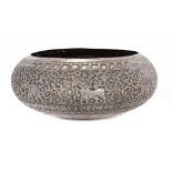 AN INDIAN SILVER REPOUSSÉ BOWL, LATE 19TH C finely chased with elephants alternating with mythical