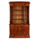 A FINE VICTORIAN OAK AND BURR OAK BREAKFRONT BOOKCASE, C1880 with stepped pediment and egg and