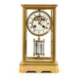 A FRENCH GILT BRASS 'FOUR GLASS' CLOCK, C1880 the enamel dial with Brocot escapement, mercury
