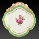 A DERBY SHELL SHAPED DESSERT DISH, C1790 brightly painted to the centre by Wardle with a group of