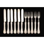 A SET OF SIX NORTH AMERICAN SILVER DESSERT KNIVES AND FIVE FORKS, C1875 by Paul Black & Co of New