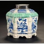 A STAFFORDSHIRE PEARLWARE TEA CANISTER, C1790 painted in underglaze blue with Pagoda and Fence