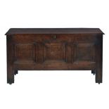 AN OAK CHEST, EARLY 18TH C the front with three raised and fielded square panels the interior fitted