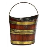 A DUTCH BRASS BOUND MAHOGANY BUCKET, EARLY 19TH C of navette section with brass handle and sheet