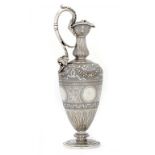 A SCOTTISH VICTORIAN SILVER CLARET JUG chased and engraved with festooons and scrolling foliage