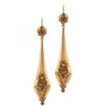 A PAIR OF VICTORIAN RUBY SET GOLD EARRINGS, C1870 applied with a filigree flower, 6.8cm, 7.5g ++In