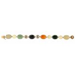 A CHINESE GOLD AND JADE BRACELET, 20TH C the six celadon and other jade cabochons alternating with