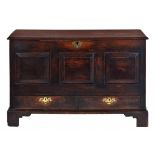 A GEORGE II OAK MULE CHEST, MID 18TH C the front with three square raised and fielded panels and two